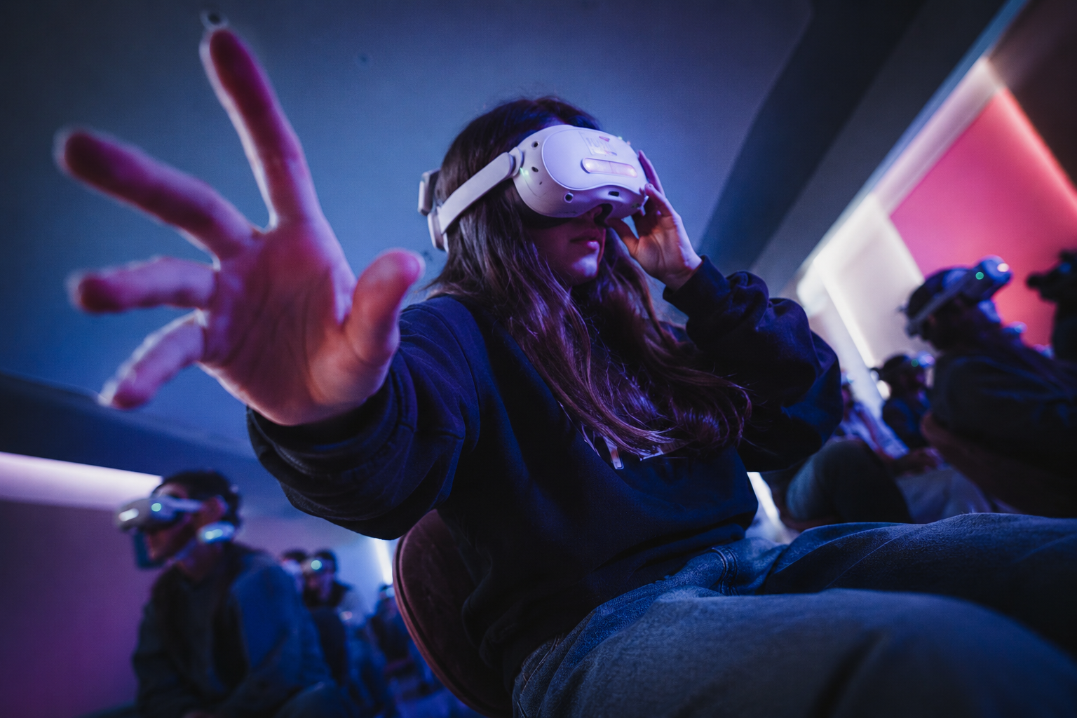 Student with a VR headset at a Technoklasė program